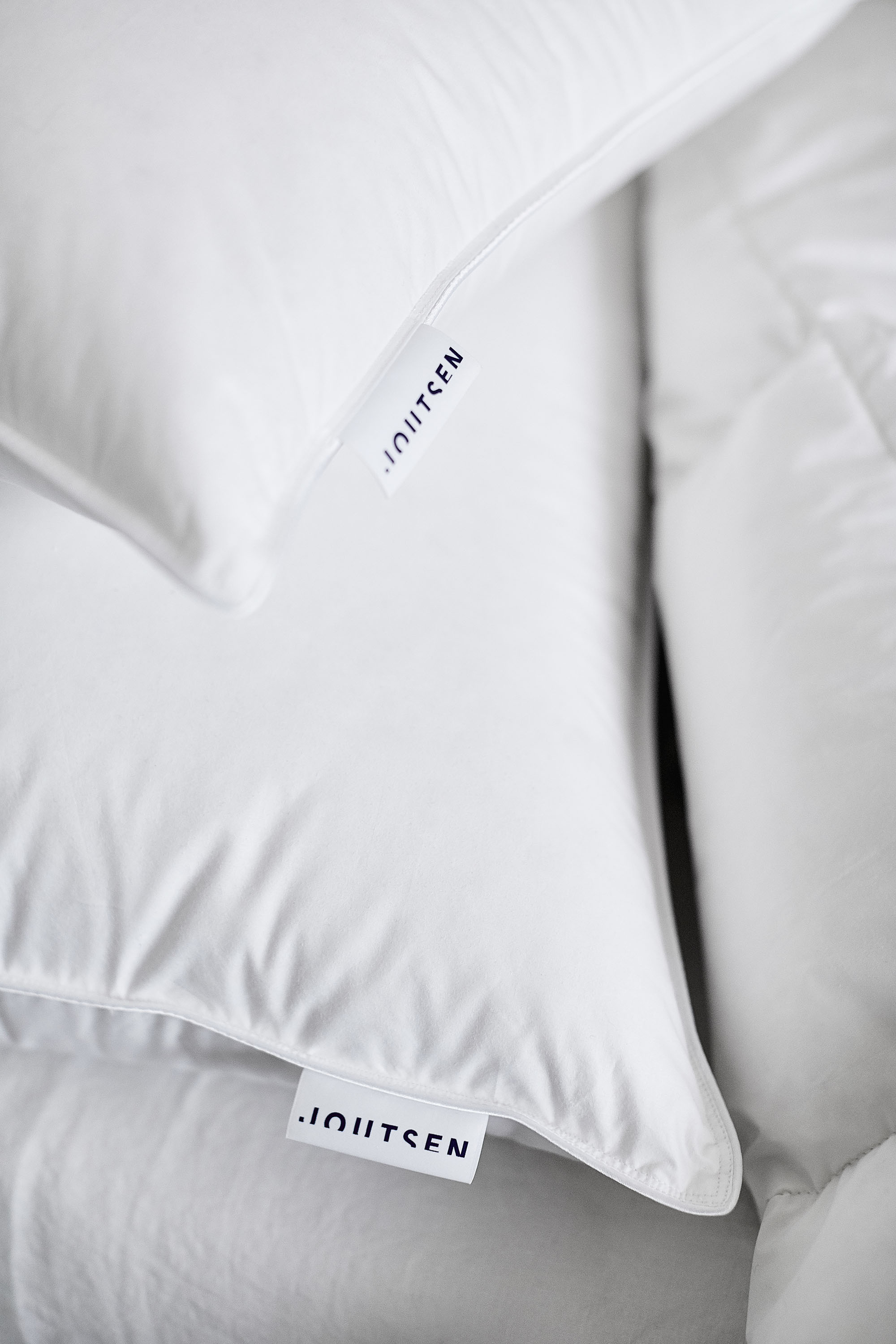 White pillows stacked.