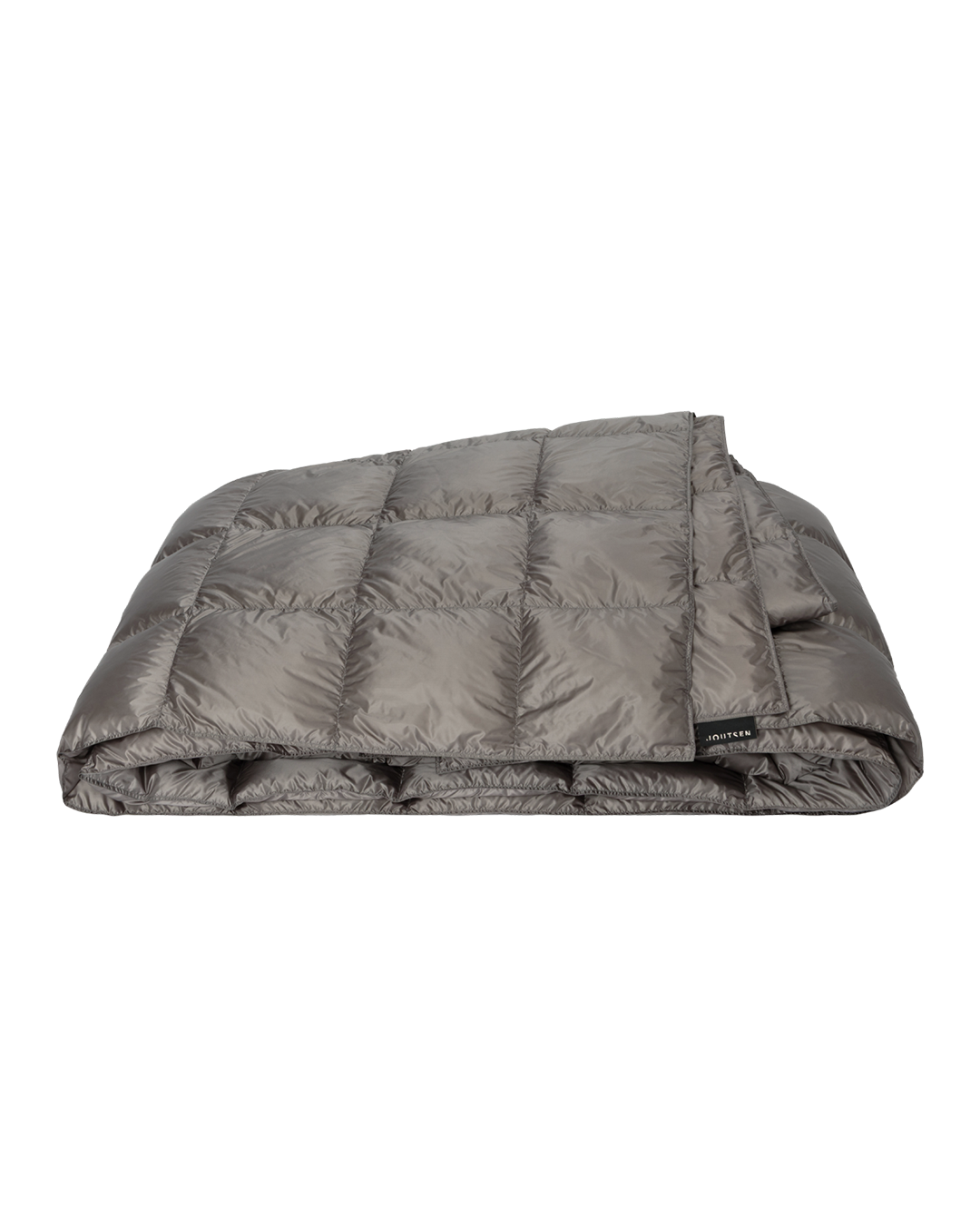 The grey Henkäys bedspread (color: Twilight grey) is neatly folded, and its surface is decorated with stitched square quilting patterns.
